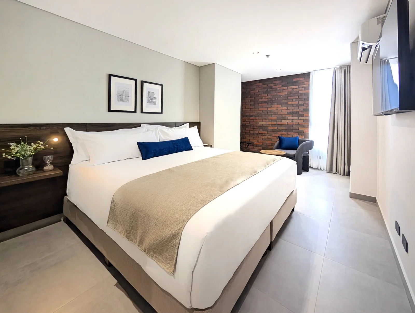 Quarto Família com dois dormitórios, sala de jantar e cozinha completa no Laureles Selection Suites